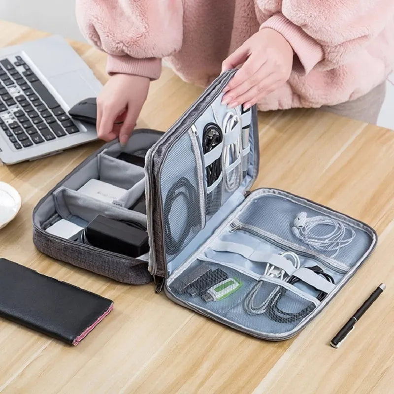 Grey waterproof double-layer travel cable organizer bag with portable handle and multiple pockets