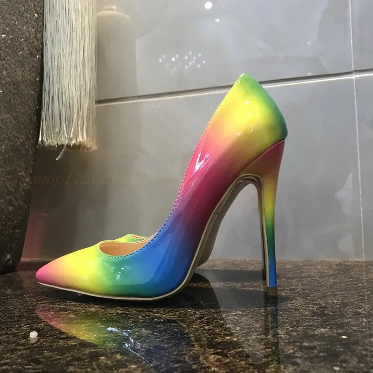 Rainbow glossy patent leather women's ultra-high heel shoe with pointed toe and thin heel.