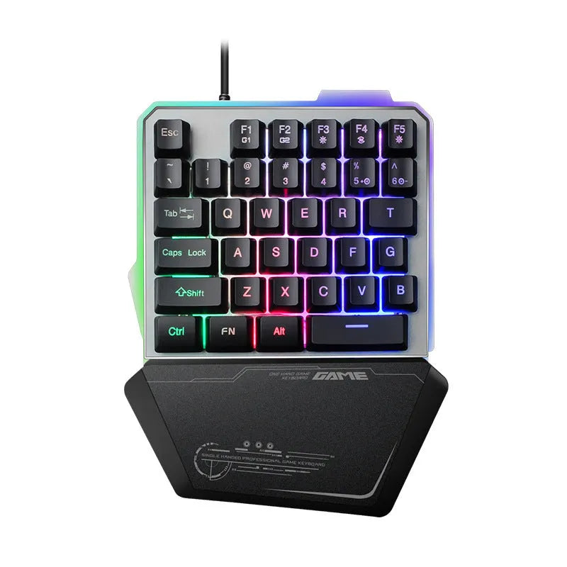 Black G40 Flow one-handed mechanical gaming keyboard with RGB backlit keys on a desk.