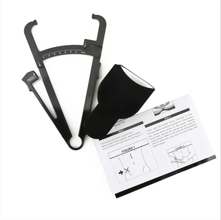 Black body fat caliper skin fold measuring instrument with two coiled measuring tapes on a grey background.