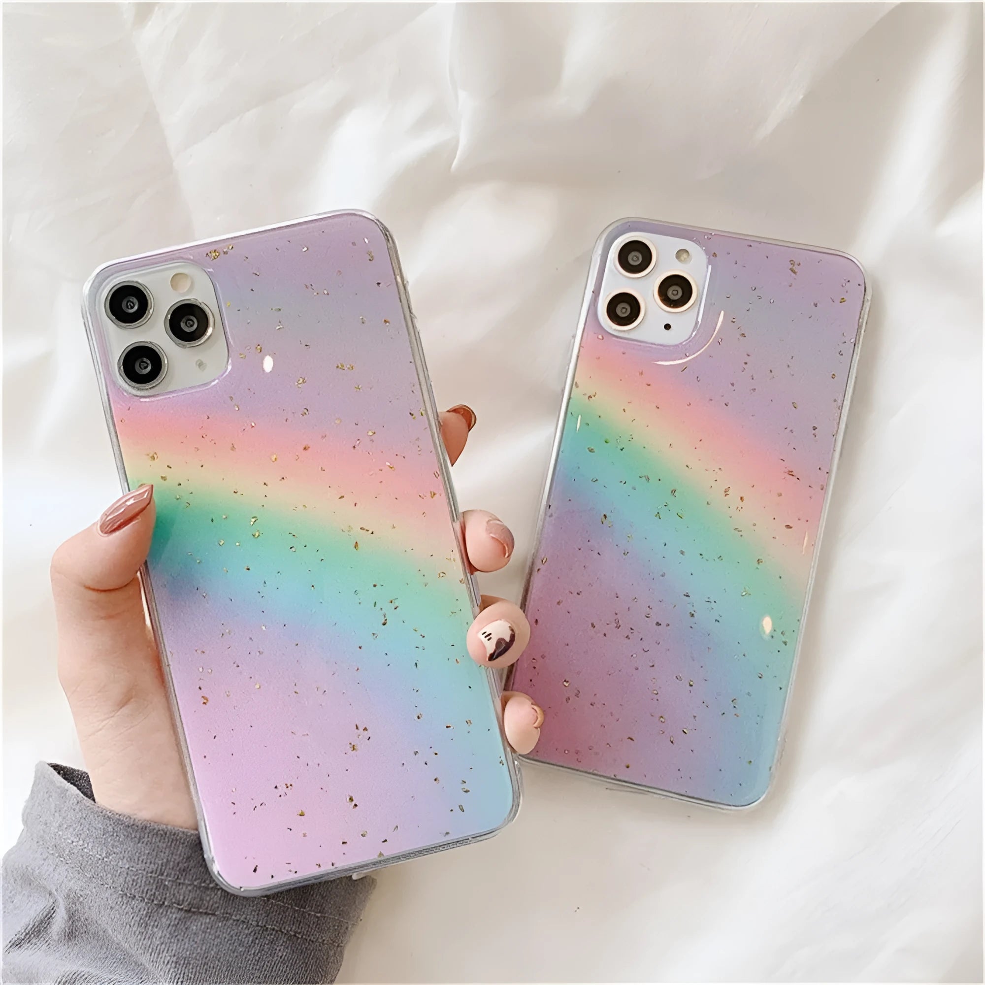 Rainbow gradient striped TPU protective case for iPhone on a white background.