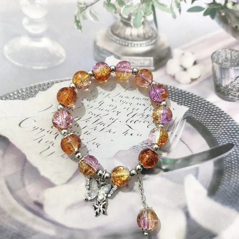 Chinese style glass bead bracelet with bamboo leaf design and manual craftsmanship details.