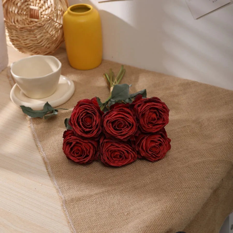 Single burnt edge simulated silk rose artificial flower with 38cm stem on neutral background