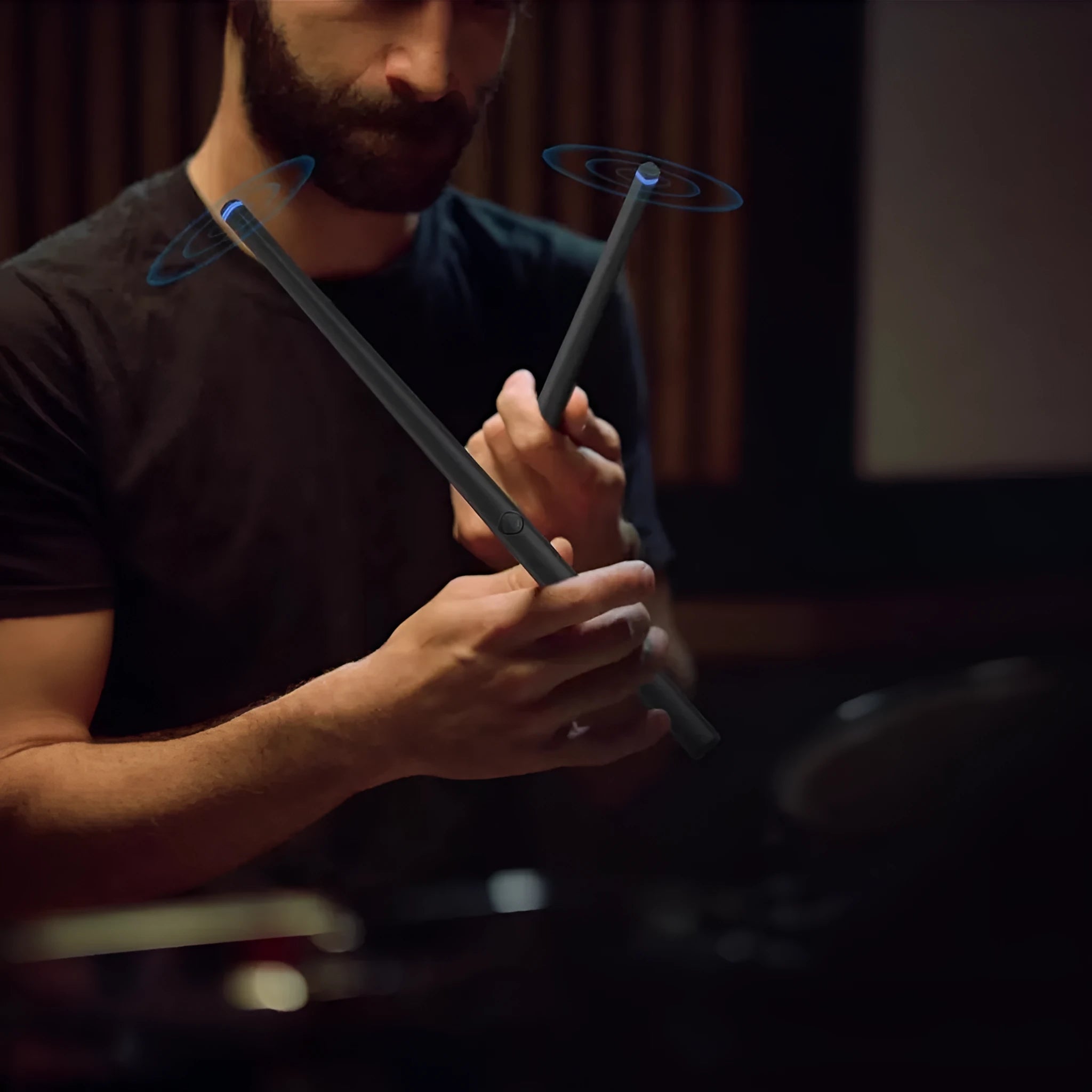 Black body sensing air drum kit with wireless drumsticks and LED lighting on control unit