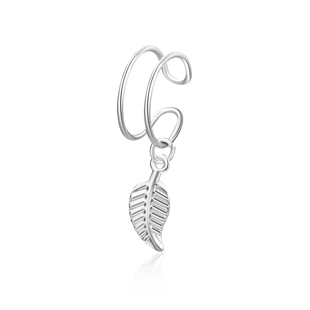 15-piece gold clip-on earring set with geometric round and ring shapes on white background