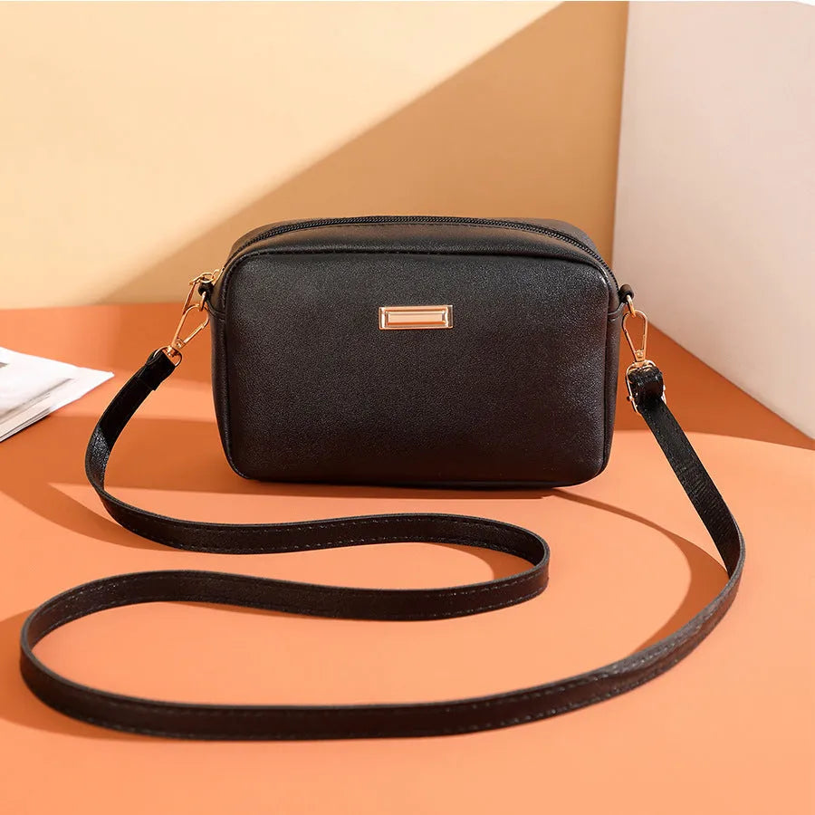 Women's solid colour PU leather shoulder bag with three-dimensional pocket in horizontal square shape