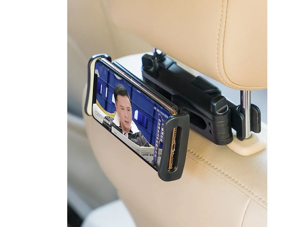 Black car phone holder mounted to rear seat base holding tablet for navigation