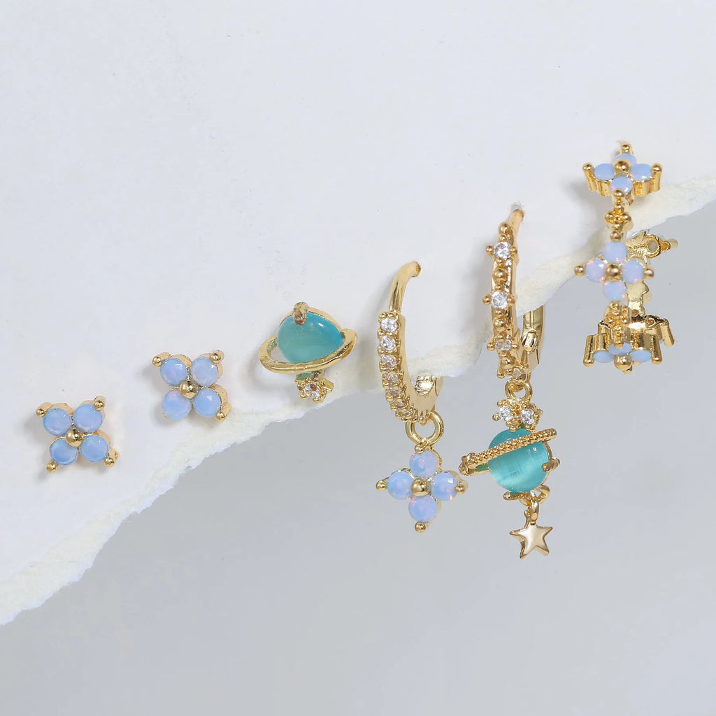 Gold and silver flower stud earrings with zircon detail in Japanese Korean sweet girl style.