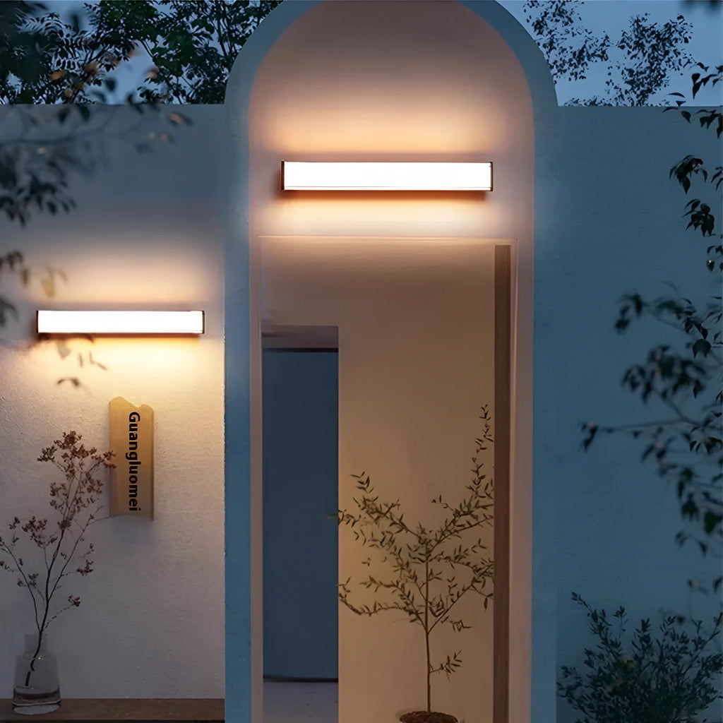 Modern outdoor wall lamp shown mounted on exterior wall, available in five size options for villa and hotel lighting
