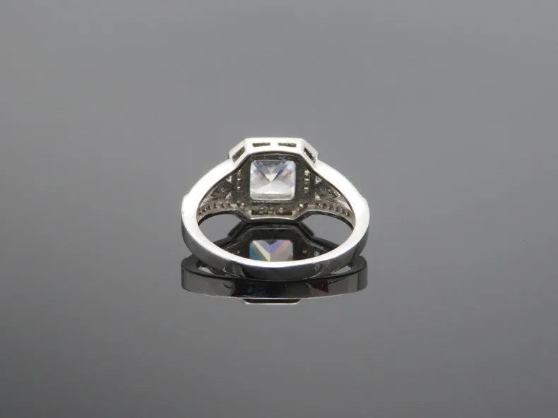 Women's platinum-coloured zircon ring with hollow geometric design and quadrilateral patterns