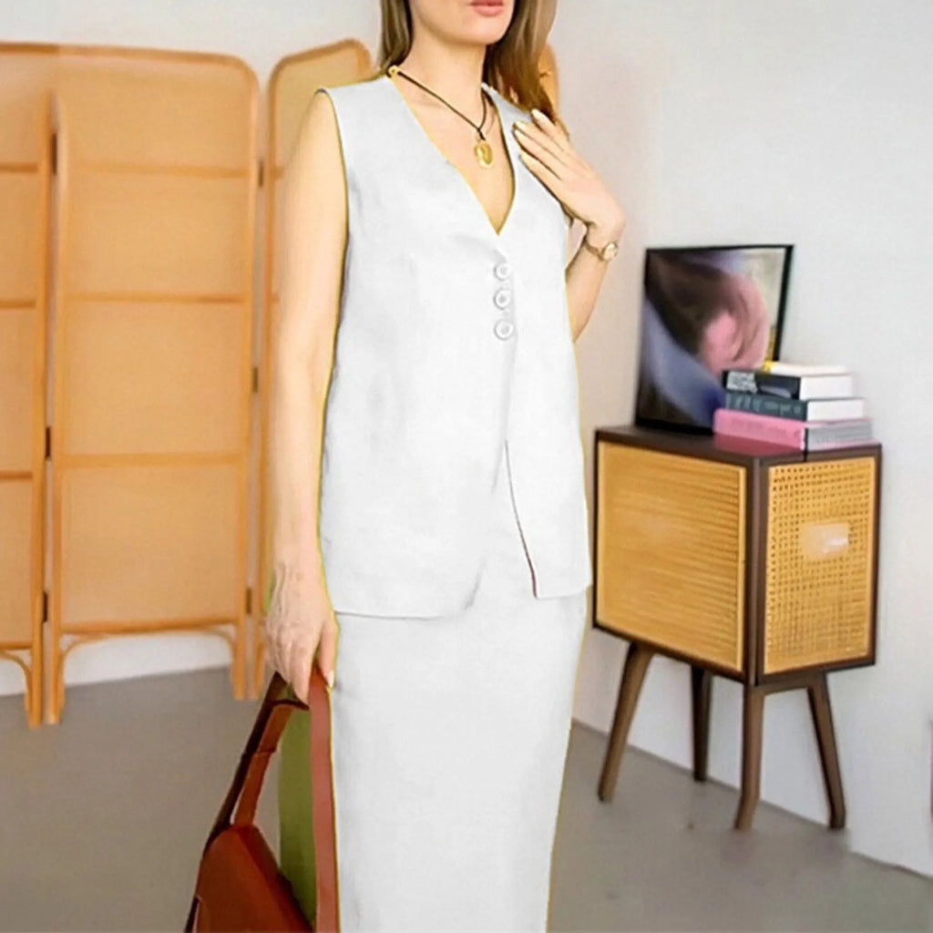 A woman wearing a blue sleeveless vest and matching long skirt from a polyester two-piece suit.