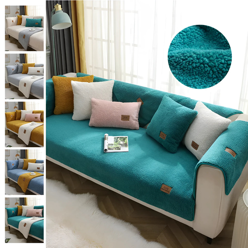 Beige plush lamb wool sofa cover with anti-slip backing laid flat on a modern grey sofa.