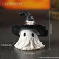 A detailed resin wizard hat ornament with a ghost theme in either kid-purple or black colour.