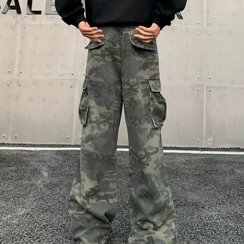 Vintage washed camouflage pattern cargo trousers with multiple pockets on a mid-waist fit.