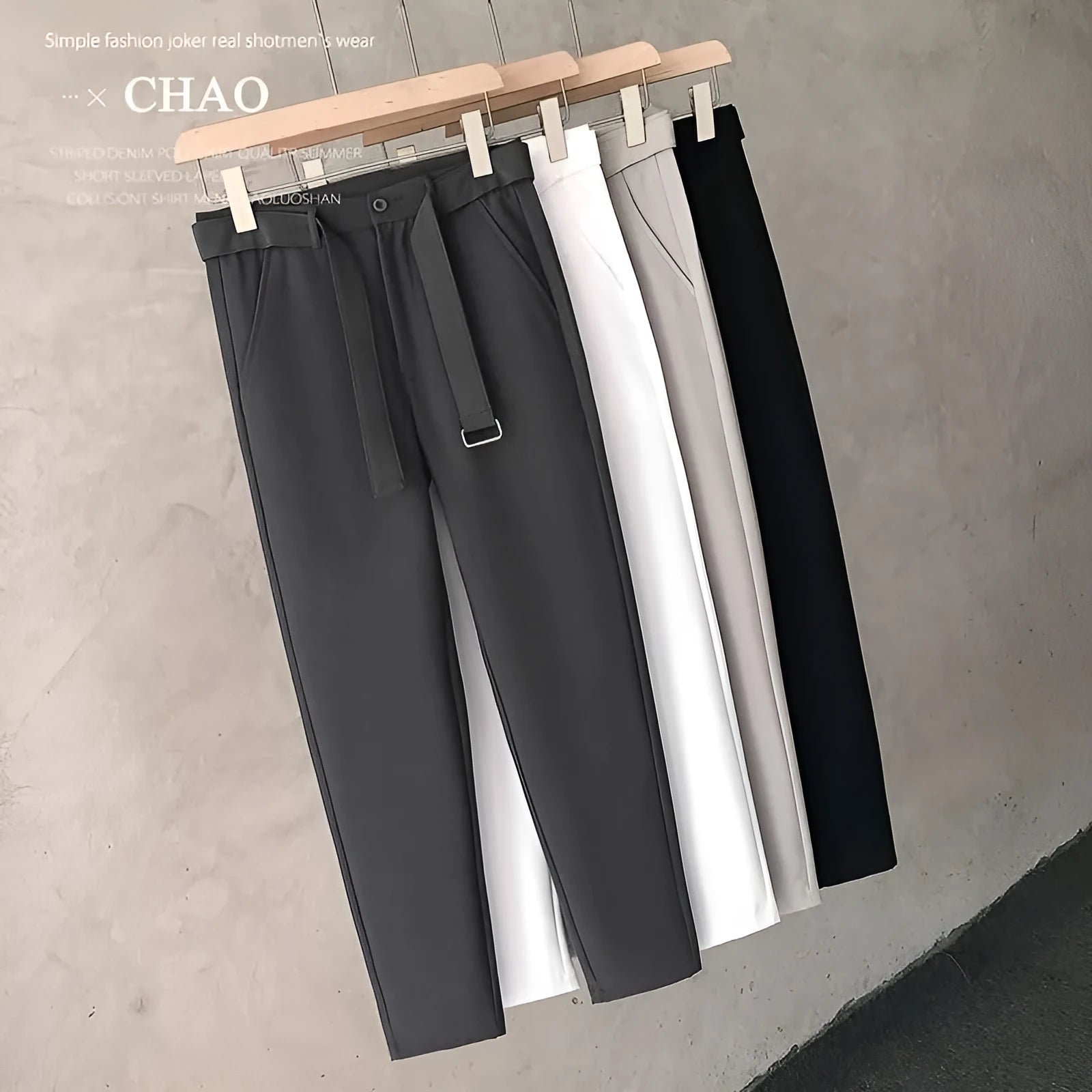 Boy wearing slim straight tapered wool trousers in grey for a business casual outfit.