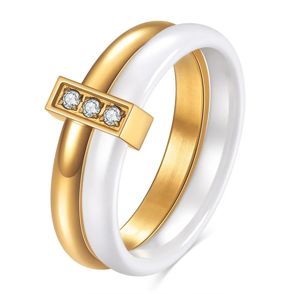 Geometric ceramic women's ring with round zirconium inlay and glossy stitching in steel black or golden white finish