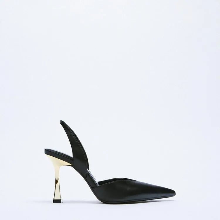 Nude patent leather pointed high heel shoe with shallow mouth, shown in apricot colour.