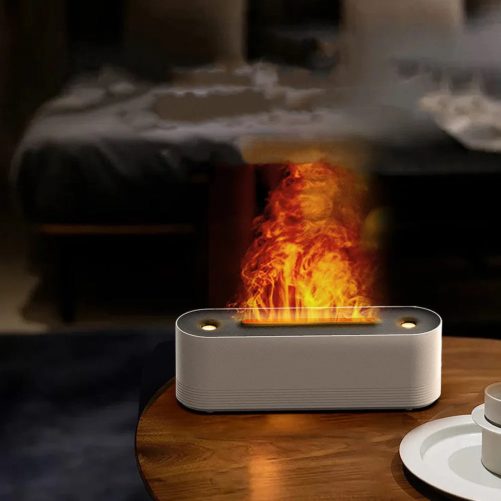 Black Flame Air ultrasonic humidifier diffuser with LED flame lights and mist output on a wooden table.