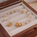 Women's glazed bracelet with floral ice crack pattern and zodiac animal modelling in electroplated finish