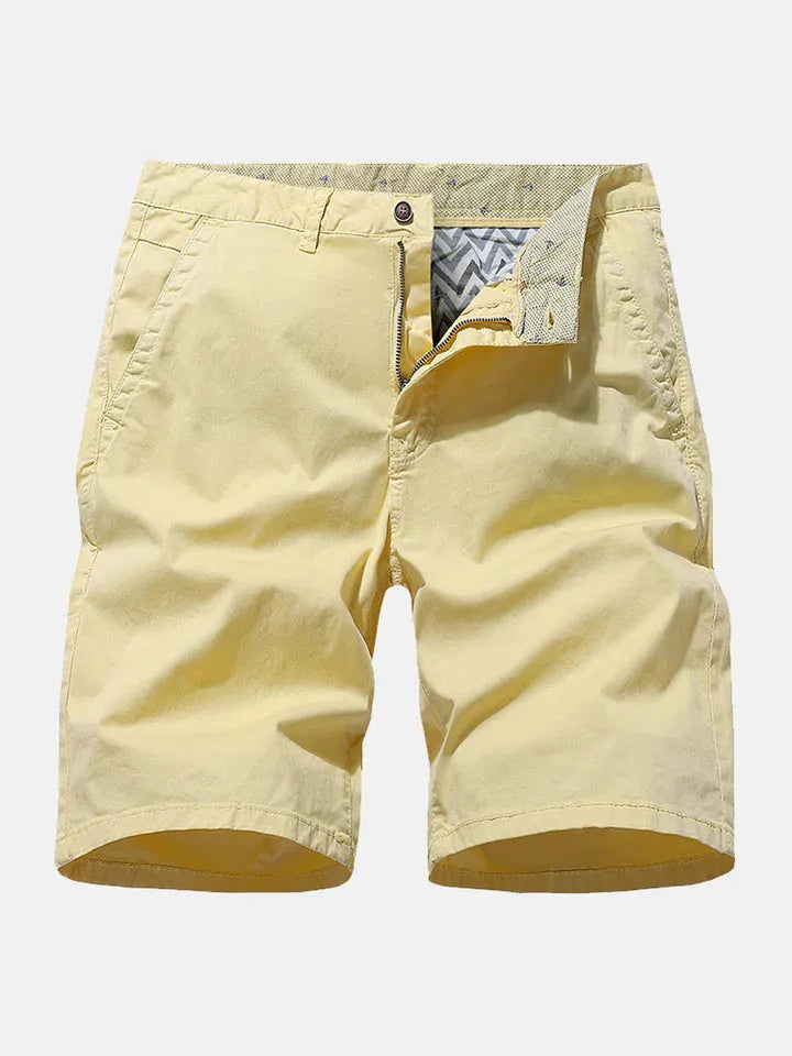 Men's blue printed denim casual shorts with elasticated waistband laid flat.