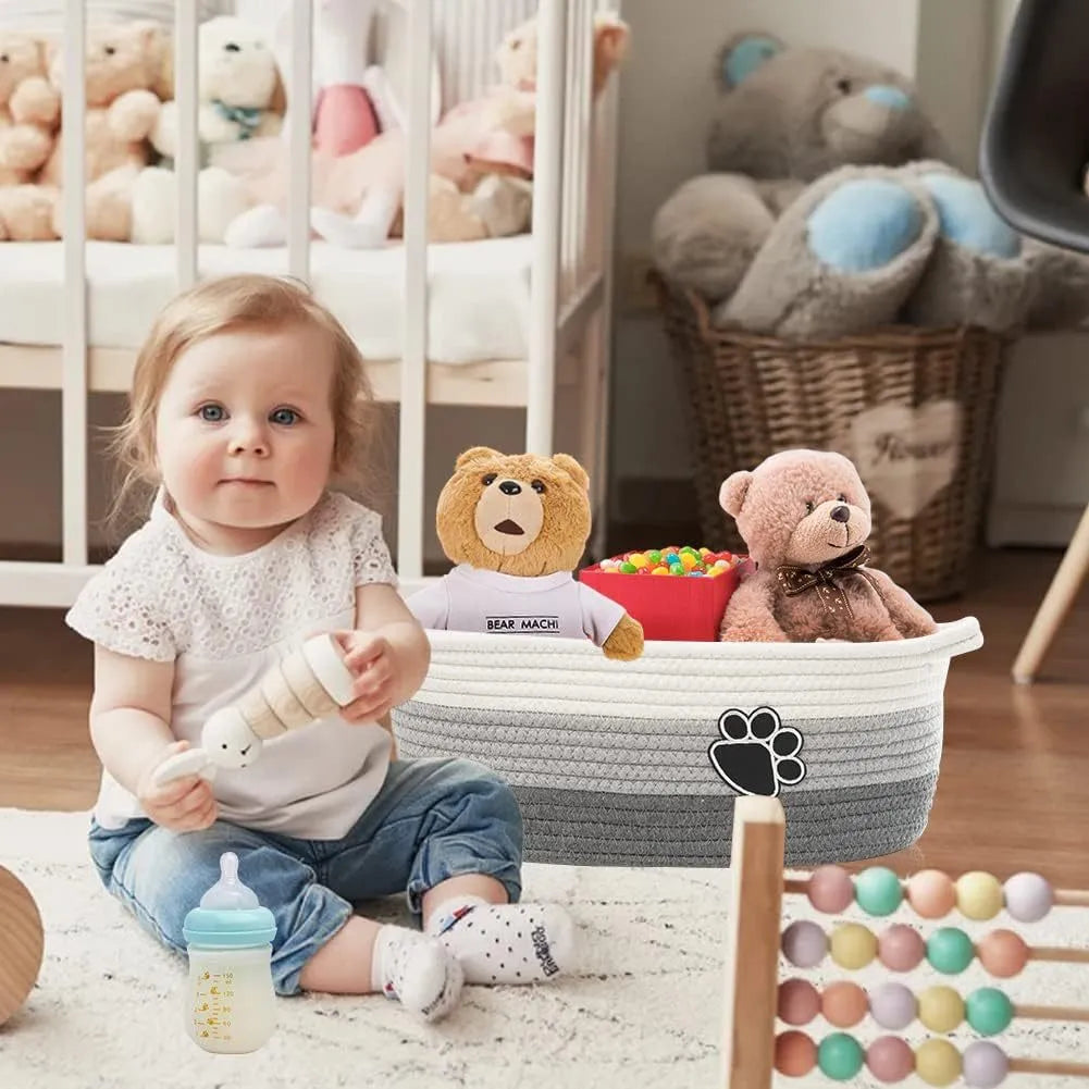 Light beige handmade cotton rope storage basket with wooden handles