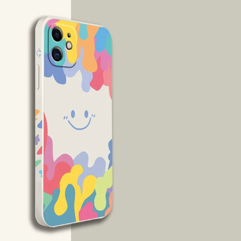 White TPU iPhone case with rainbow smiley face design and attached lanyard