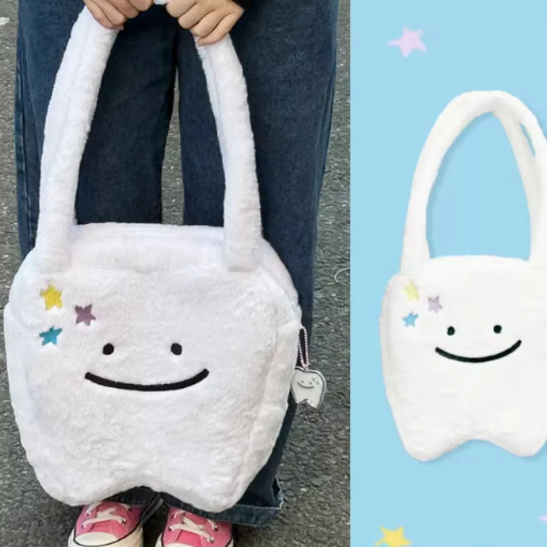 White crossbody shoulder bag with plush large tooth pattern and zipper closure