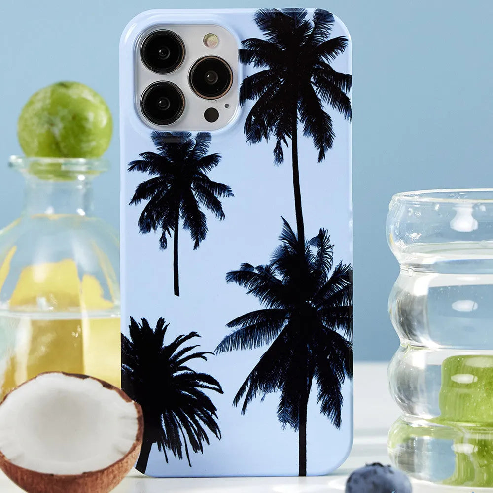 Clear transparent TPU iPhone case with a folding bracket stand extended on a table.