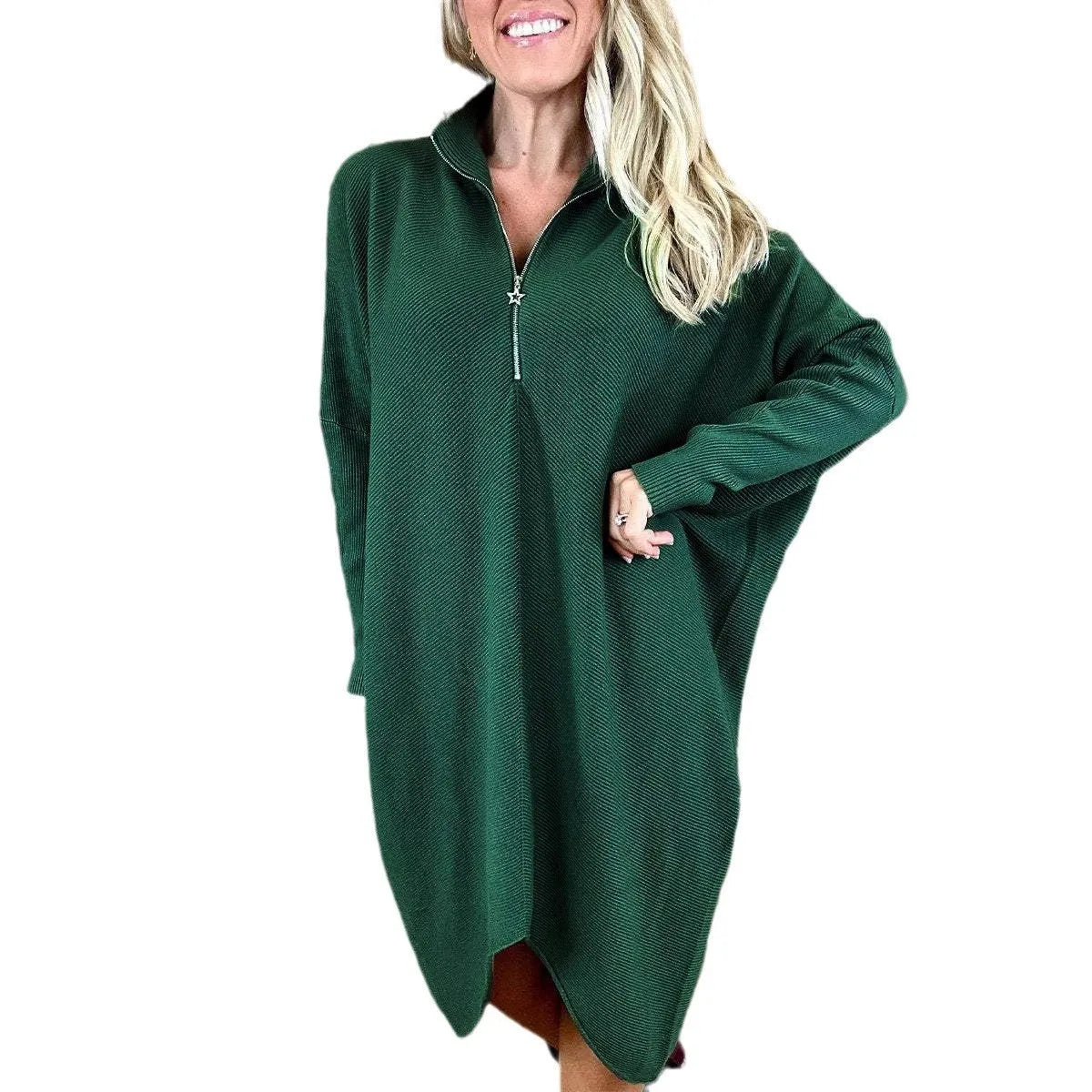 A women's solid colour loose knitted dress with raglan sleeves and a front zipper.