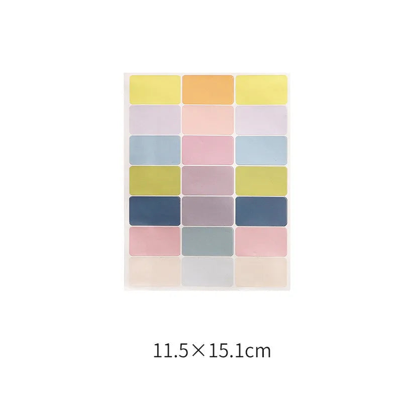 Assortment of paper adhesive stickers, labels, A6 rulers, and sticky notes in various colours and grid layouts.