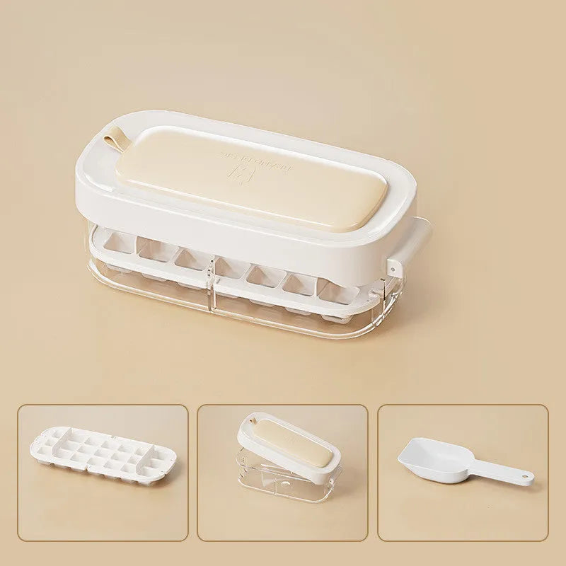 High capacity blue ice cube tray with ice grid and attached storage for the included shovel.
