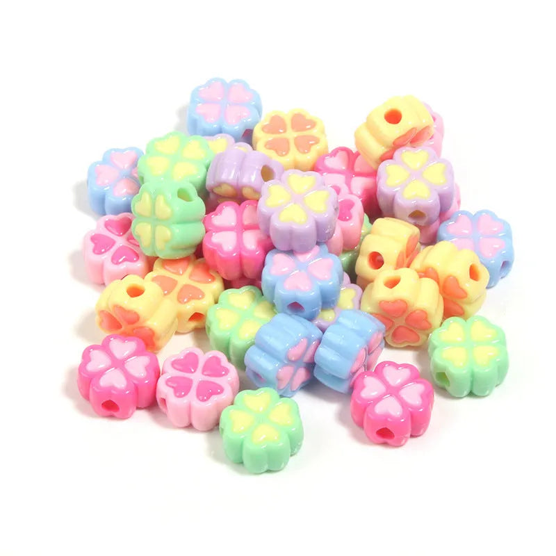 15mm acrylic four-leaf clove beads in light colours including rose red, pink, yellow, green, blue, and purple with frosted finish