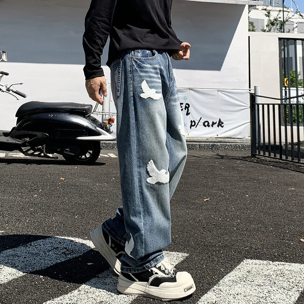 Men's mid-waist straight-leg jeans in blue cotton denim with button placket available in multiple sizes