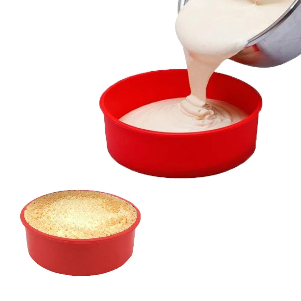 Set of three round red silicone cake moulds in 4-inch, 6-inch, and 8-inch sizes on a baking tray.