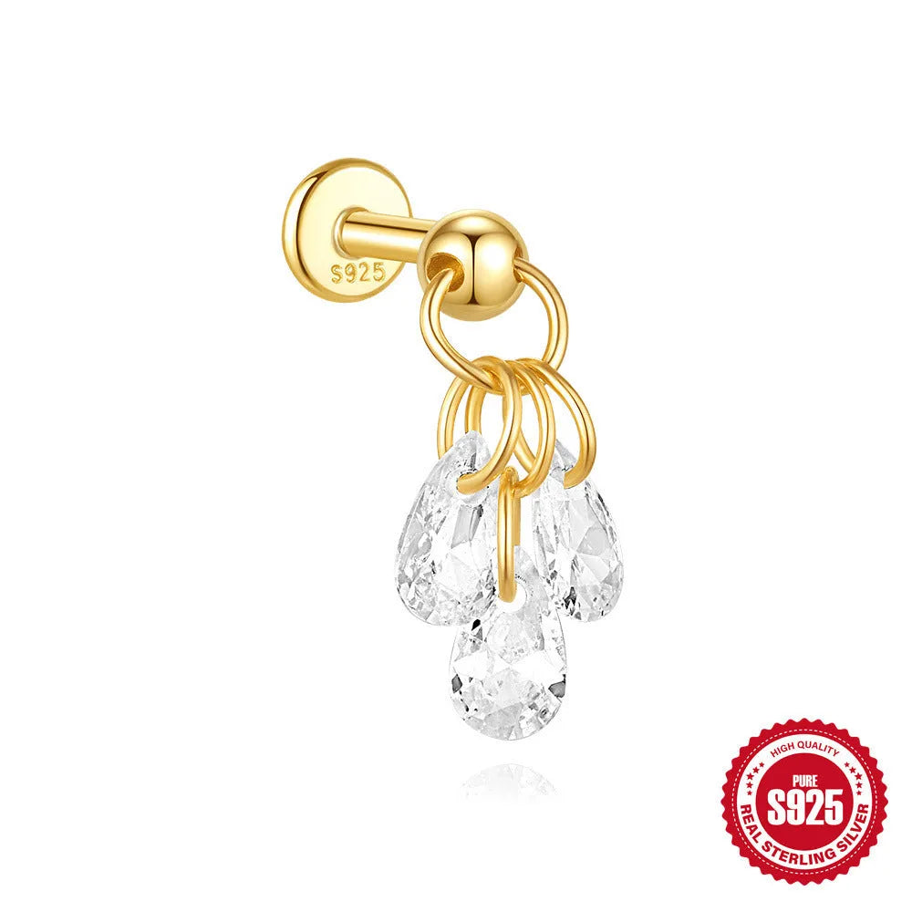 Geometric moon and star earrings in S925 sterling silver with embedded diamonds and a gold colour finish.