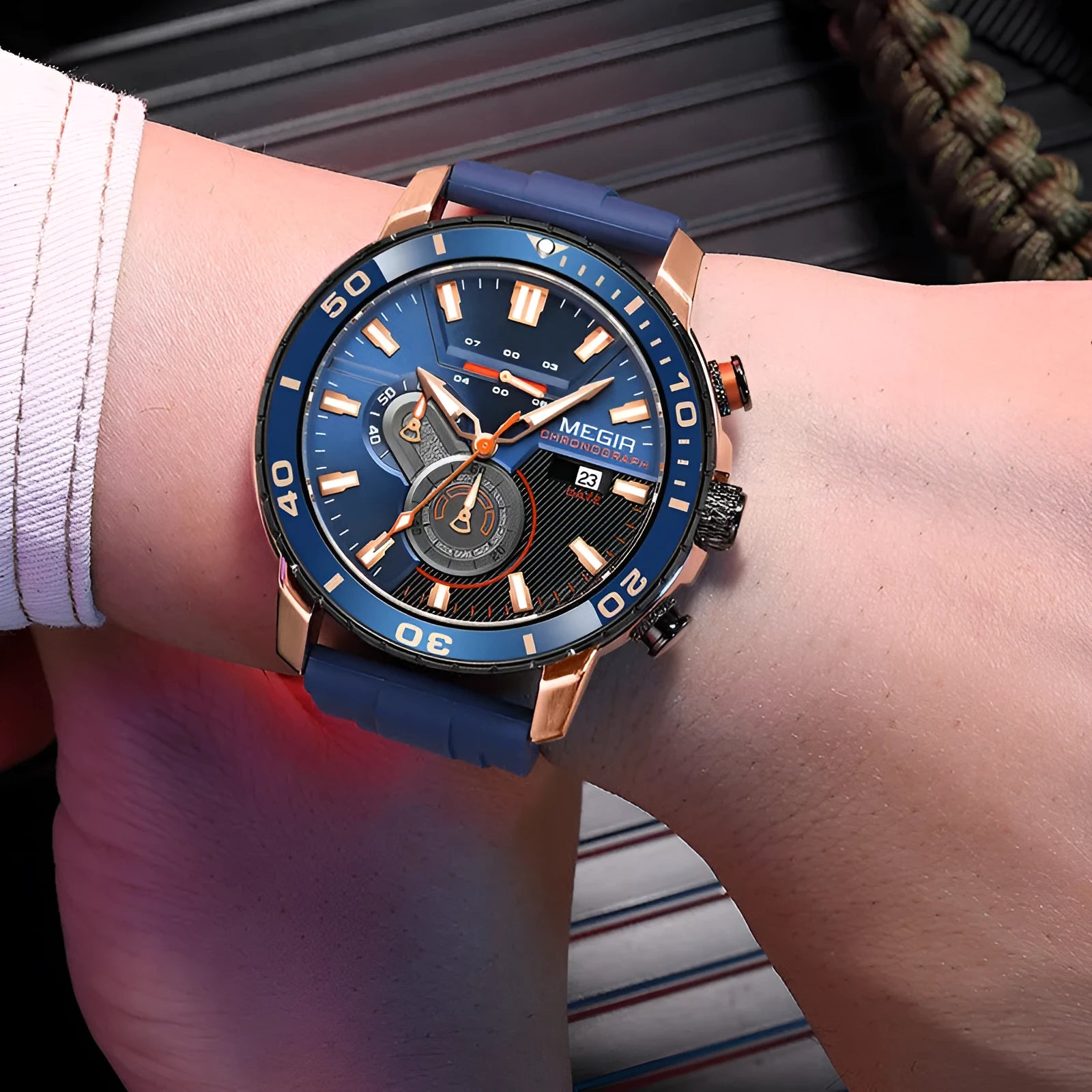 Men's sports chronograph watch with blue dial, 53mm diameter, mineral glass mirror, stainless steel case back, and pin buckle