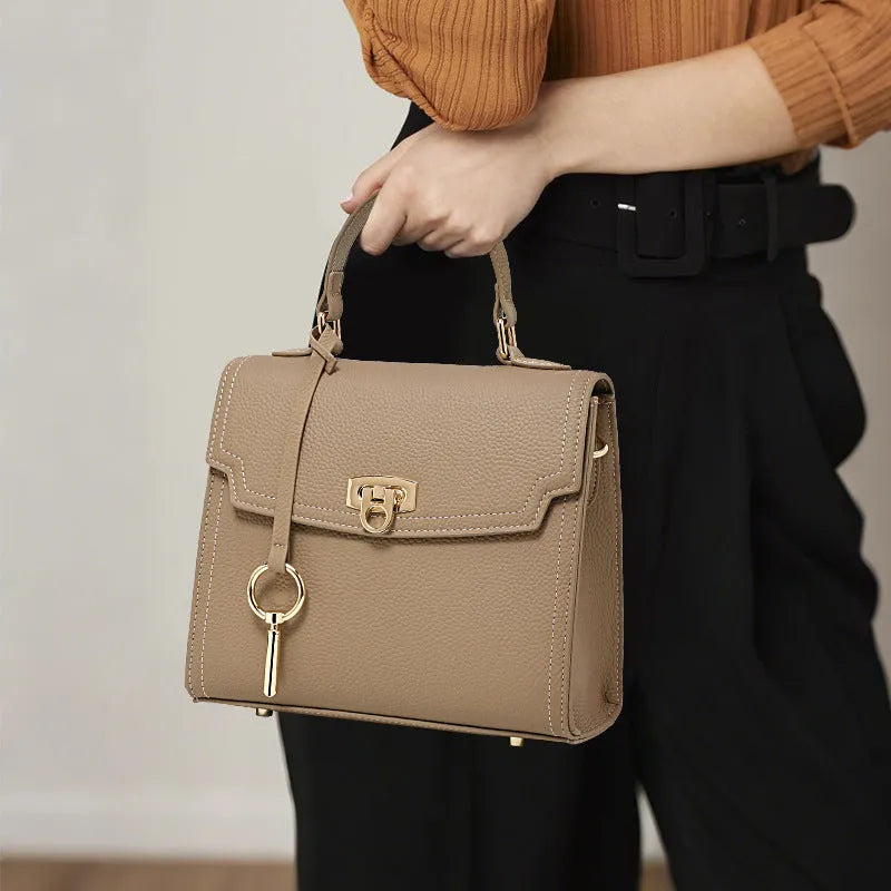 Elephant grey genuine leather vintage lock handbag with crossbody strap and square shape