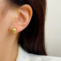 Gold copper heart shaped ear clips without ear holes on non-pierced earlobe, simple style
