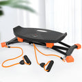 Black mini fitness skiing machine with elastic hand strap for home exercise.