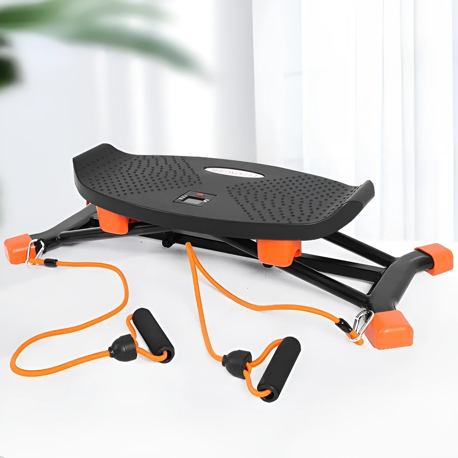 Black mini fitness skiing machine with elastic hand strap for home exercise.