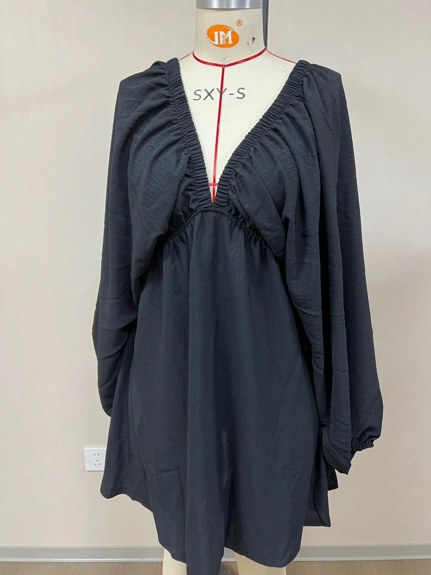 Women's apricot V-neck dress with puff sleeves and swing skirt design for office wear