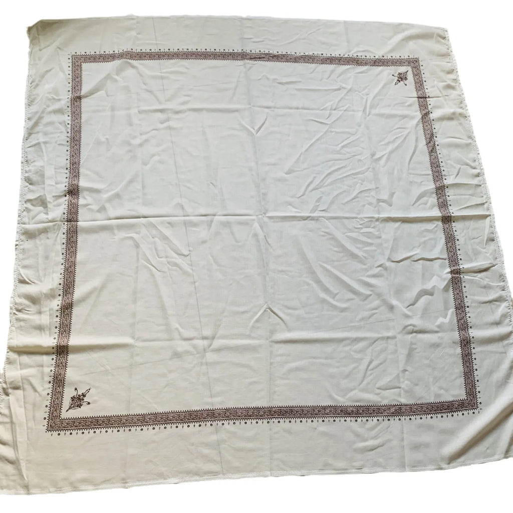A large brown printed square polyester scarf laid flat, showing its 138x138 cm size.