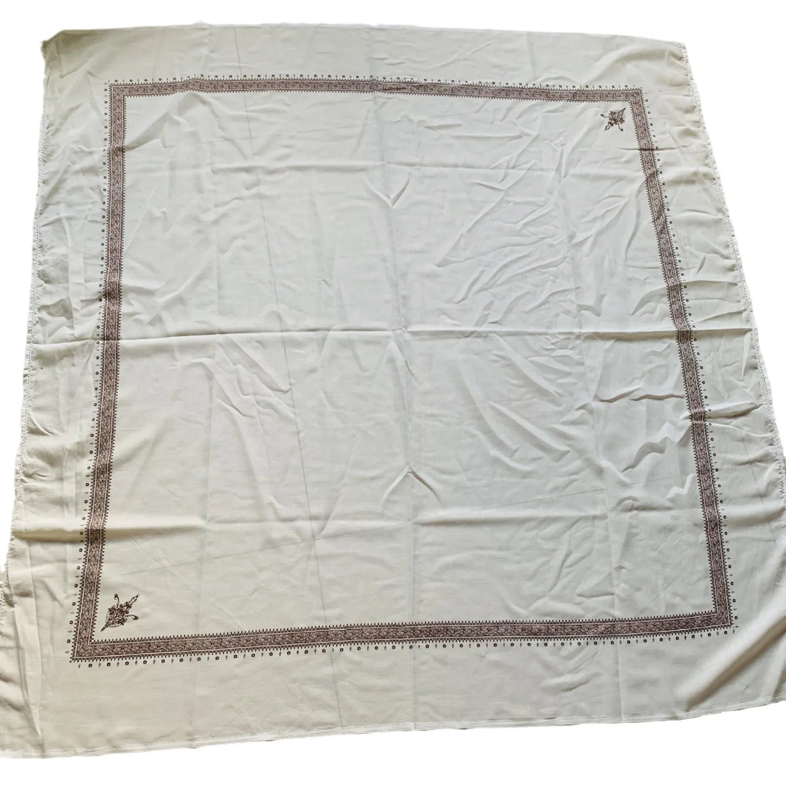 A large brown printed square polyester scarf laid flat, showing its 138x138 cm size.