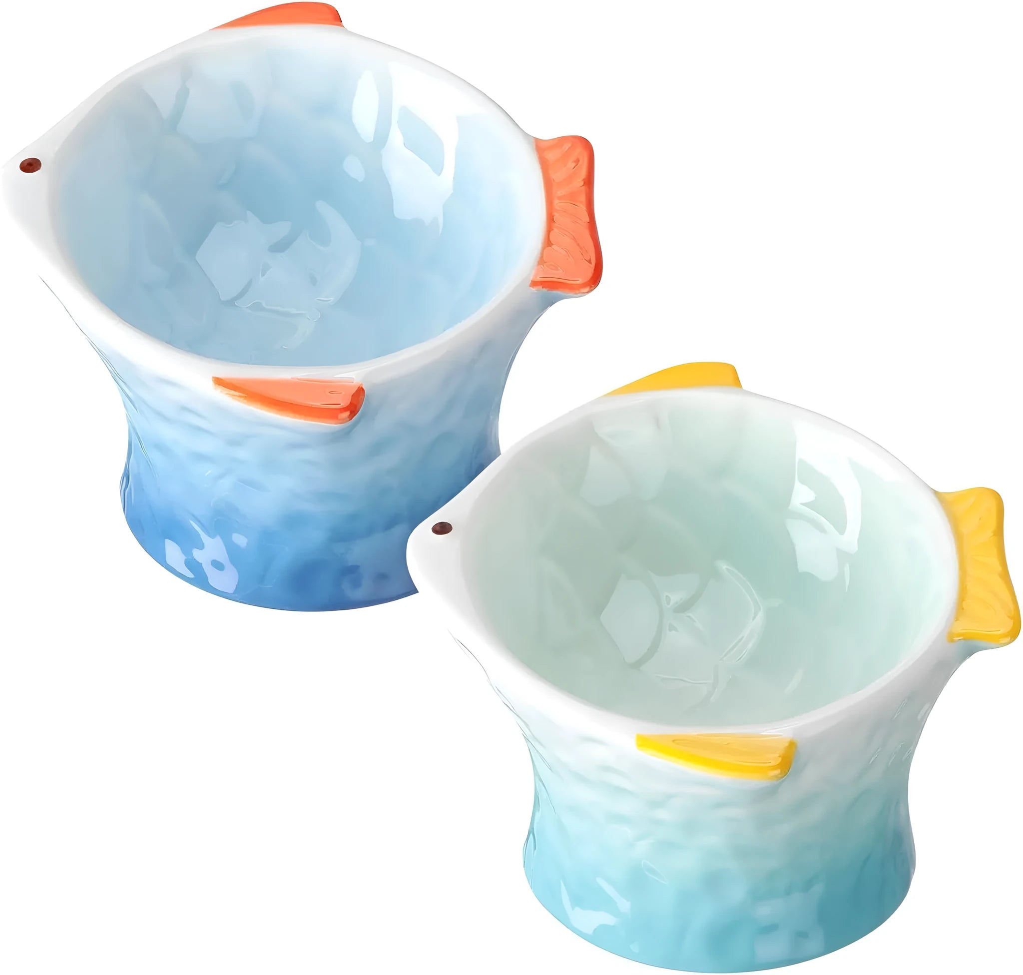 Blue fish-shaped ceramic cat bowl with tilted design and non-slip base on a wooden surface.