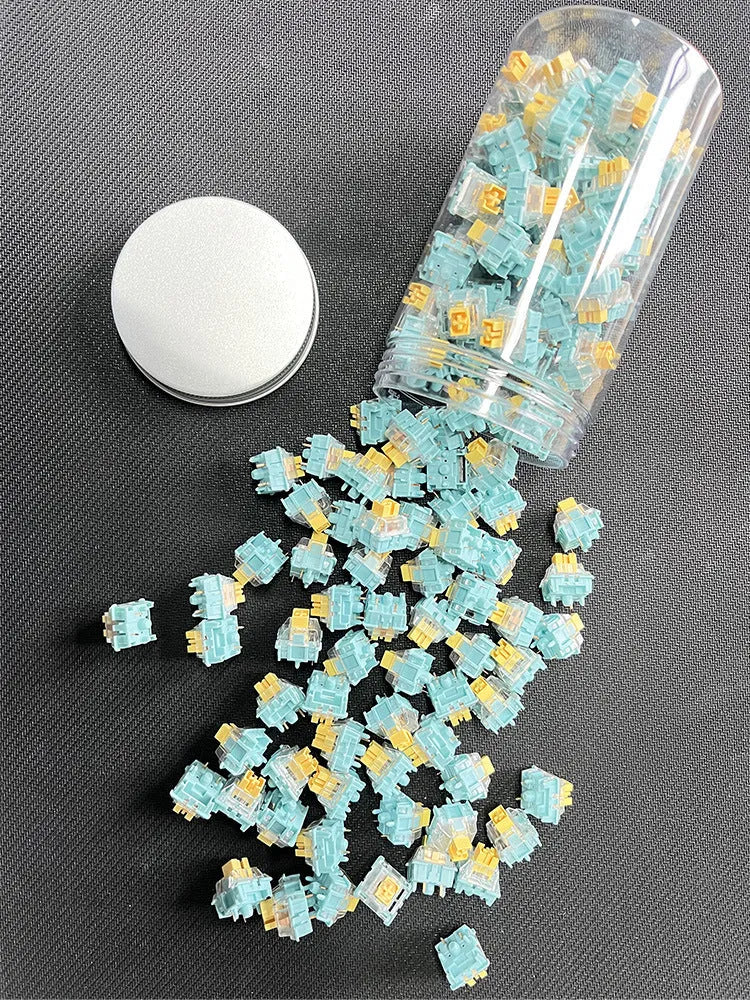 Pack of 36 Sea Salt Lemon PRO Mute tactile keyboard switch bodies for mechanical keyboard modding.