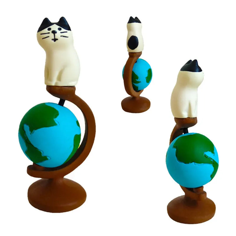 Cartoon-style Statue of Liberty cat resin figurine on display