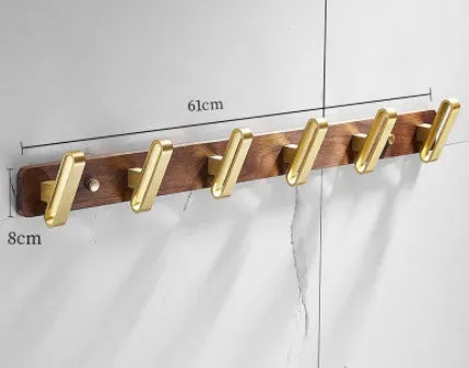 Black walnut bathroom clothes hooks with aluminium frame and brass finish in perforated row design