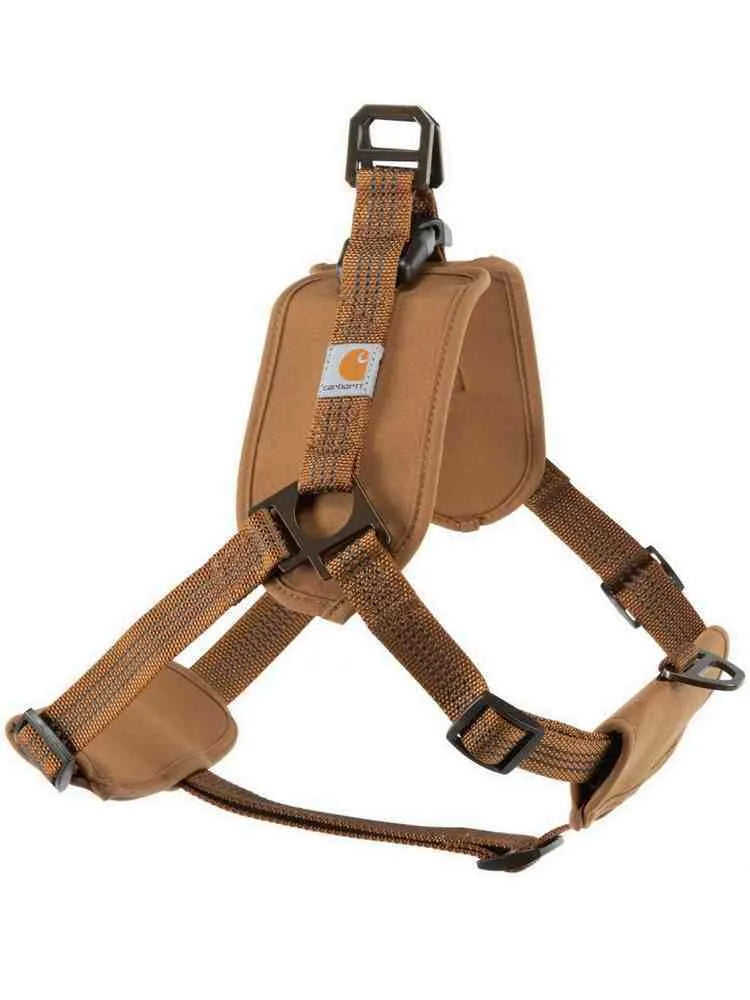 Dog wearing adjustable chest strap training belt with reflective hand holding rope attached