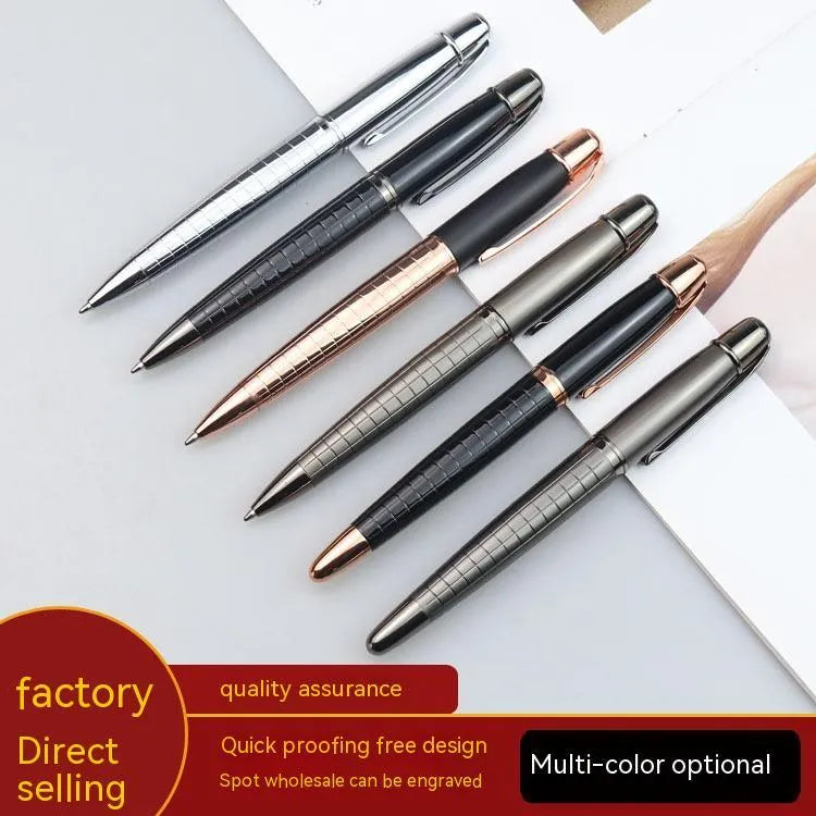 Grey metal retractable roller pen for business signatures on a white background.