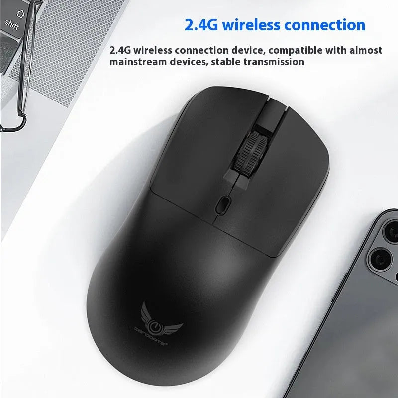 Black wireless computer mouse with three audio control buttons beside scroll wheel